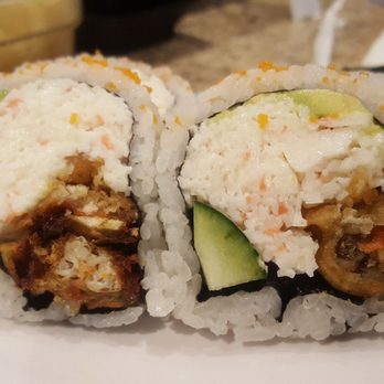Sushi Hana - Spider Roll. Soft shell crab, imitation crabmeat, avo, & a tiny cuke. Sliced so thin, it falls apart picking them up w/chopsticks. Sad. - Japanese Near Me - Bothell, Washington