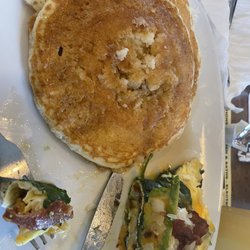 Perkins Restaurant & Bakery - Spinach, avocado , bacon omelette with a side of buttermilk pancakes