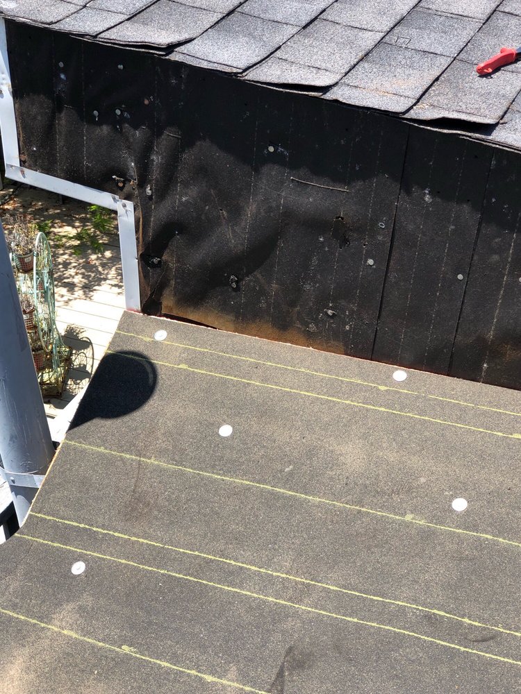 Slide of Kennedy Roofing