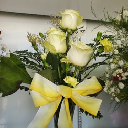 Laws Feed Store - Flowers in the cooler or made to order. We deliver.