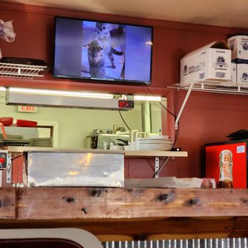 Haro Brothers - a kitchen with a television and a counter - Breakfast & Brunch Near Me - Ava, Missouri Haro Brothers - a kitchen with a television and a counter - Breakfast & Brunch Near Me - Ava, Missouri