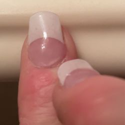Couture Nails And Spa - What women wants this? Here you can see how far it is from the cuticle bed and poor edges
