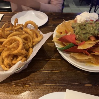 Coolidge Corner Clubhouse - Mile High Nachos and Basket Curly Fries - Sports Bars Near Me - Brookline, Massachusetts