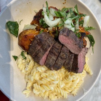 Flower Child - Steak, Gluten-Free Mac & Cheese, Red Chile Glazed Sweet Potato - Salad Near Me - Houston, Texas Flower Child - Steak, Gluten-Free Mac & Cheese, Red Chile Glazed Sweet Potato - Salad Near Me - Houston, Texas