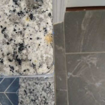 ARJ Remodeling - a close up of a bathroom floor - General Contractors Near Me