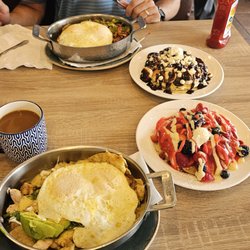 Honey Berry Pancakes and Cafe - Chocolate chip banana pancakes, Signature Honeyberry pancakes, corned beef skillet and chilaquiles skillet