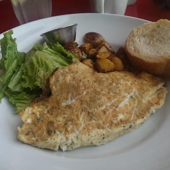 Linh Cafe - My omelette.. you can't see the cheese cause it's inside. - Vietnamese Near Me - Vancouver, British Columbia