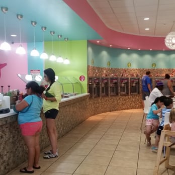 sweetFrog - a group of people eating at a restaurant - Ice Cream & Frozen Yogurt Near Me - Peekskill, New York sweetFrog - a group of people eating at a restaurant - Ice Cream & Frozen Yogurt Near Me - Peekskill, New York