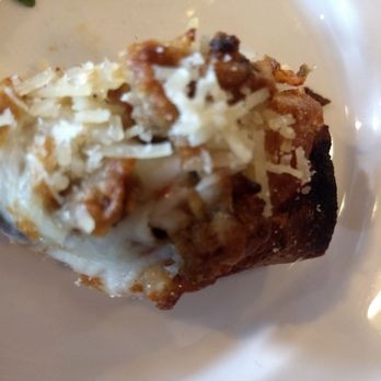 Taverna - Sausage Pizza Slice -- the tiny portion my husband gave me to try. - Cocktail Bars Near Me - Kapalua, Hawaii