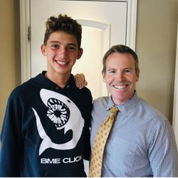 Eli Orthodontics - 14yo son and Dr Eli after brackets removal day!
