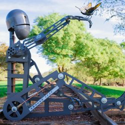 Artfully Rogue - Robot Sculpture with metal butterfly