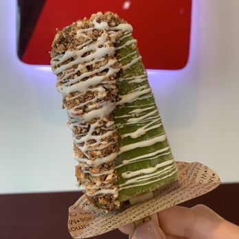 Popbar - New Orleans - Green tea pop with chocolate dip and pretzel/shire chocolate drizzle - Gelato Near Me - New Orleans, Louisiana Popbar - New Orleans - Green tea pop with chocolate dip and pretzel/shire chocolate drizzle - Gelato Near Me - New Orleans, Louisiana