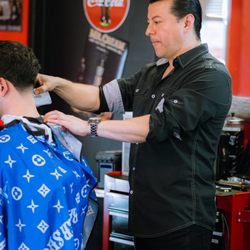 The Cream Shop - Alfredo providing a taper to a customer