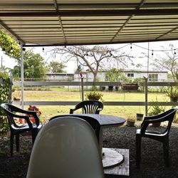 Rico Arepa - Covered outdoor seating area