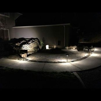 Don's Affordable Landscape - a patio at night - Masonry/Concrete Near Me Don's Affordable Landscape - a patio at night - Masonry/Concrete Near Me