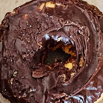 Donut Bistro - Chocolate donuts that look like my 16-month-old granddaughter decorated them. - Donuts Near Me - Sparks, Nevada