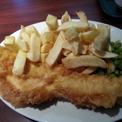 Ashvale Fish Restaurant - Fish and chips with a side of peas. The fish is Haddock and the chips are huge! £9.45 (About $15.80 USD)