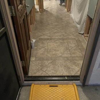 DustBusters Floor Removal - Entryway before they started - Demolition Services Near Me DustBusters Floor Removal - Entryway before they started - Demolition Services Near Me