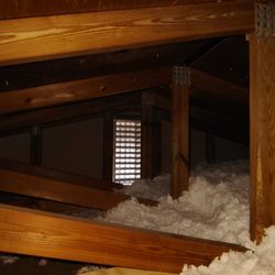 This is on the opposite end of the attic where there's not much insulation as it's over the carport. Something identical to this should be o