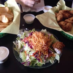 Awesome Gizzards!!!!! And, homage chips and salad... Yummy. Also, you have to see the fantastic mural with all the locales faces