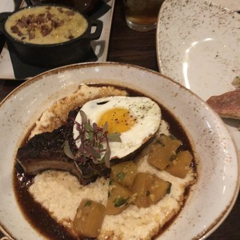 Handsome Hog - Blackened pork chop with grits - Southern Near Me - St Paul, Minnesota