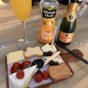 Barrels And Boards - Fruit and Cheese board for one with mimosa - Wine Bars Near Me - Groveland, Florida Barrels And Boards - Fruit and Cheese board for one with mimosa - Wine Bars Near Me - Groveland, Florida