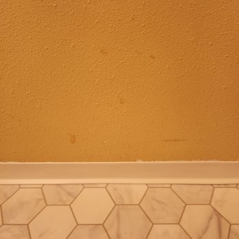 Best Buy Floors - Picture of toilet ring glue they left on our wall! - Flooring Near Me - Bellevue, Washington