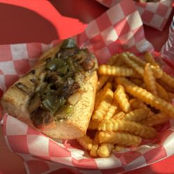 Johnny's - Sausage sub and krinkle cut fries.