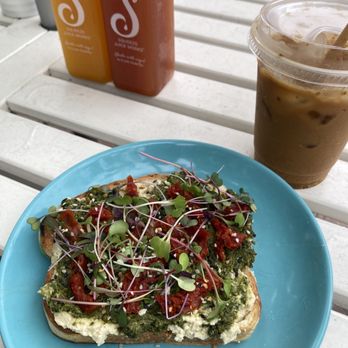 Squeeze Juice Works - a blue plate with a sandwich on it - Juice Bars & Smoothies Near Me - St Petersburg, Florida Squeeze Juice Works - a blue plate with a sandwich on it - Juice Bars & Smoothies Near Me - St Petersburg, Florida