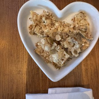Cafe Pasqual's - Small complimentary snack- tasted like Parmesan cheese mixture. - Vegetarian Near Me - Santa Fe, New Mexico
