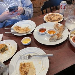 Roti, Momos, half eaten somosa Roti, Momos, half eaten somosa