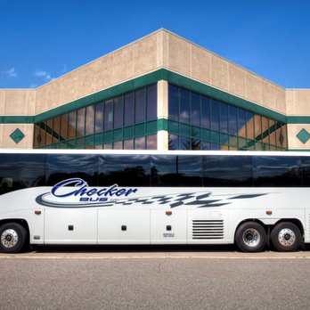 Checker Transport - 56 Passenger Coach, Wifi, DVD, Blu-Ray, reclining seats - Taxis Near Me - Marquette, Michigan