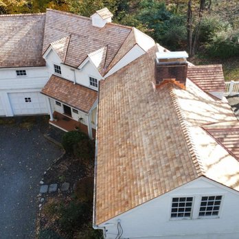 GA Castro Construction - We completed a full wood shingle roof replacement on a property in Weston, CT, using high-quality materials for a lasting solution - Roofing Near Me - Stamford, Connecticut GA Castro Construction - We completed a full wood shingle roof replacement on a property in Weston, CT, using high-quality materials for a lasting solution - Roofing Near Me - Stamford, Connecticut