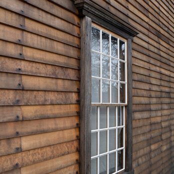 Popular Contracting - a close up of a window on a wooden house - General Contractors Near Me - Wrentham, Massachusetts Popular Contracting - a close up of a window on a wooden house - General Contractors Near Me - Wrentham, Massachusetts