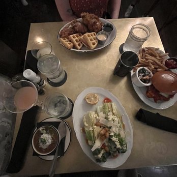 Moonshine Grill - gumbo soup of the day, romaine salad, chicken sandwich, chicken and waffles - Southern Near Me - Austin, Texas