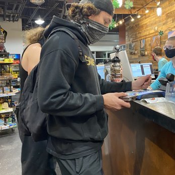 Ubergrippen Indoor Climbing Crag - Nick and his brother at the counter - Rock Climbing Near Me - Denver, Colorado