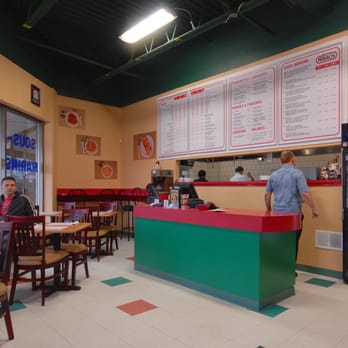 Pizza Nikkos - the interior of a restaurant - Pizza Near Me - Dollard-Des-Ormeaux, Quebec Pizza Nikkos - the interior of a restaurant - Pizza Near Me - Dollard-Des-Ormeaux, Quebec