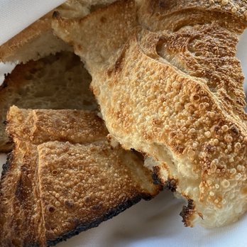 Theos Estiatorio - Warm crispy bread complementary - Greek Near Me - Fort Lauderdale, Florida