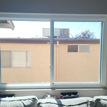 Distinctive Home Improvements - Living room window: Catalina. Notice both sides are the same size. - Windows Installation Near Me - San Diego, California