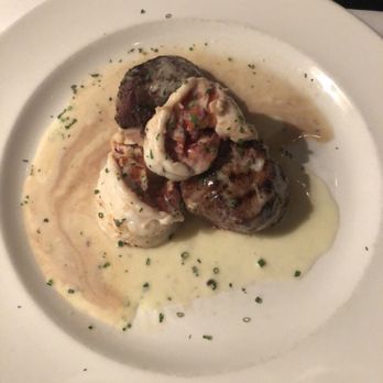 The Capital Grille - Butter poached lobster tails and tenderloin - Steakhouses Near Me - Mclean, Virginia The Capital Grille - Butter poached lobster tails and tenderloin - Steakhouses Near Me - Mclean, Virginia