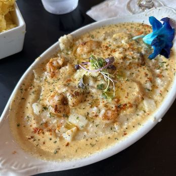 Autum Restaurant & Lounge - Shrimp and Cajun grits with cheese eggs and breakfast potato mash. - Lounges Near Me - Richmond, Virginia Autum Restaurant & Lounge - Shrimp and Cajun grits with cheese eggs and breakfast potato mash. - Lounges Near Me - Richmond, Virginia