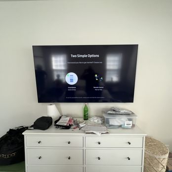 Stillman Solutions - TV mounted on master bedroom wall. - Home Theatre Installation Near Me Stillman Solutions - TV mounted on master bedroom wall. - Home Theatre Installation Near Me