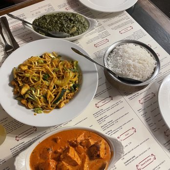 Himalayan Kitchen - a variety of dishes of food on a table - Himalayan/Nepalese Near Me - Durango, Colorado