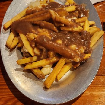 The Irish Mafia Brewing Company - a plate of fries and gravy - New American Near Me - Bloomfield, New York The Irish Mafia Brewing Company - a plate of fries and gravy - New American Near Me - Bloomfield, New York