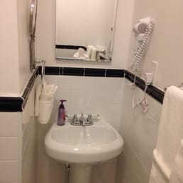 Sinks need at least a small shelf to put toiletries. Sinks need at least a small shelf to put toiletries.
