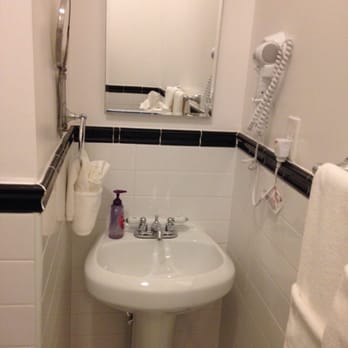 Henry Norman Hotel - Sinks need at least a small shelf to put toiletries. - Hotels Near Me - Greenpoint, New York Henry Norman Hotel - Sinks need at least a small shelf to put toiletries. - Hotels Near Me - Greenpoint, New York