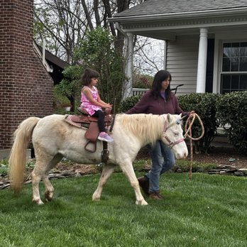 Ponies Plus - My daughter riding her unicorn - Party Equipment Rentals Near Me