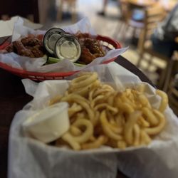 Buffalo Phil's - 20 wings with curly fries and side of queso