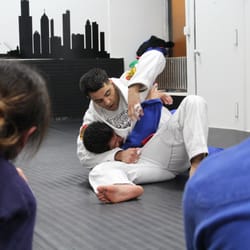 Chicago School Of Grappling - Amy and Joe watching Nick Cimm's detailed instructions