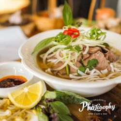 Pholosophy - Pho Chin - Tender slow cooked beef, onions, holy basil, bean sprouts, our famous 12 hour broth and served with homemade sate sauce.